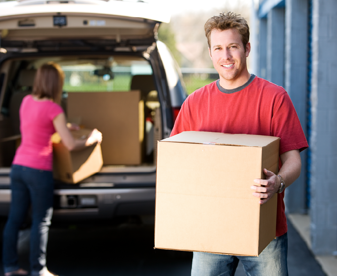 Man with box-01 Self storage in Youngsville, NC